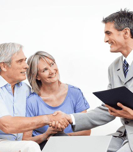 Handshake Between Senior Couple And Financial Adviser- Financial advisers In Whitsundays, QLD