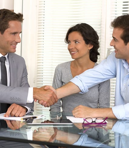 Happy Couple Seal Their Deal With Financial Adviser - Financial advisers In Whitsundays, QLD